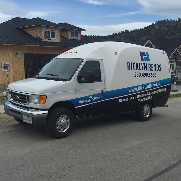 Ricklyn Renos van outside new home build