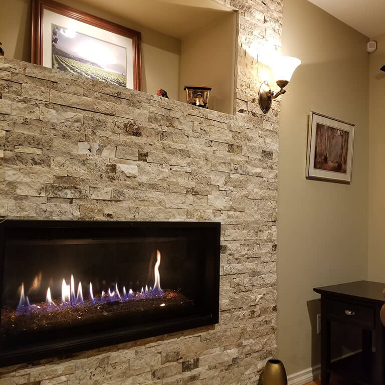 Ricklyn Renos stone surround gas fireplace Ricklyn Renos stone surround gas fireplace